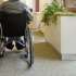 Elderly man in wheelchair in nursing home.